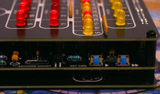 Seconds on/off jumper and time setting buttons